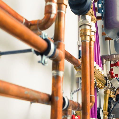 Boiler room with copper pipes